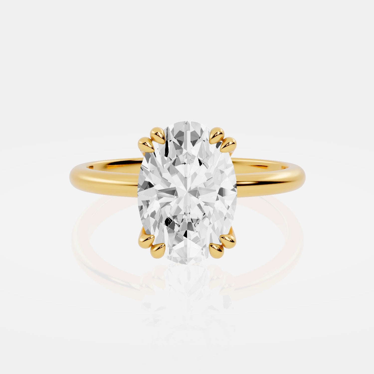 Gold ring with a large diamond on a light gray background